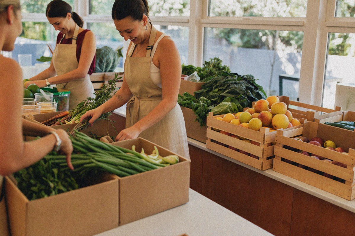 Volunteers sorting produce at a community pantry
