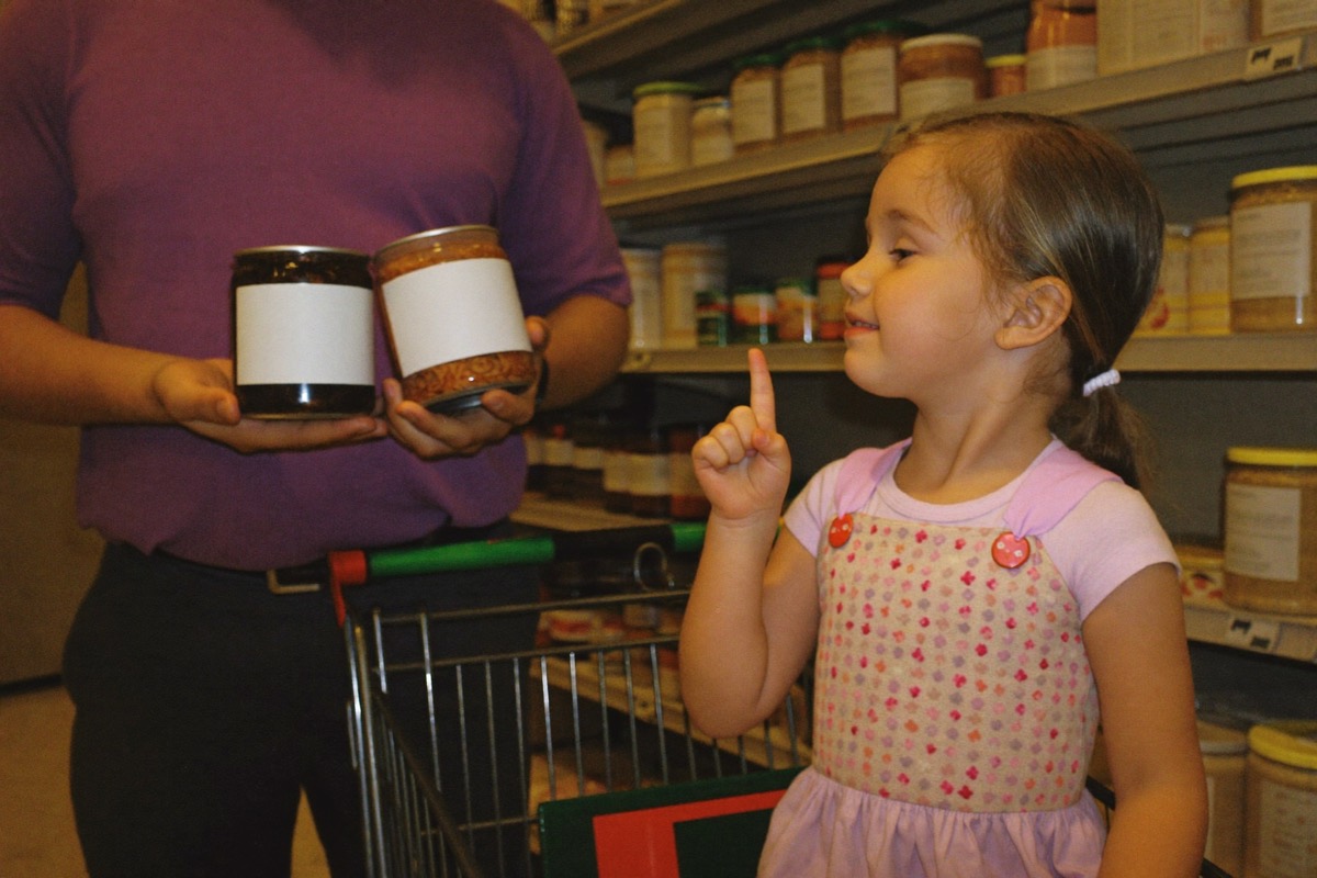 Comparing products in a grocery aisle